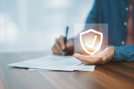 person signing documents and being protected